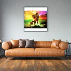 Olifant met jong in het water als sfeerimpressie aan de muur