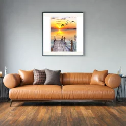 Zonsondergang Zeezicht als sfeerimpressie aan de muur