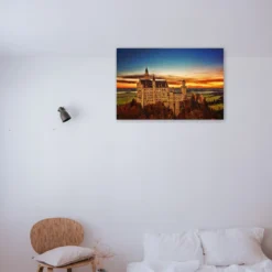 Kasteel met zonsondergang als sfeerimpressie aan de muur
