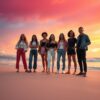 Vrienden op zonsondergang aan het strand
