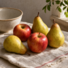 Stilleven met peren en appels in rustig daglicht