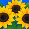Schilderen op nummer drie grote zonnebloemen tegen een blauwe lucht